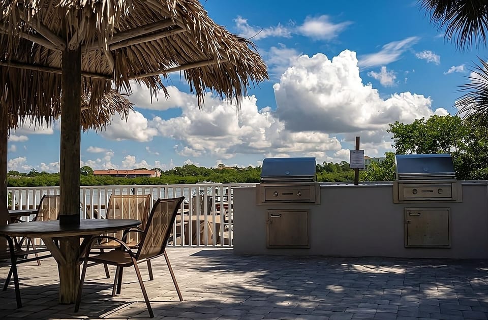 Gather for breezy cookouts with grills and waterfront seating.