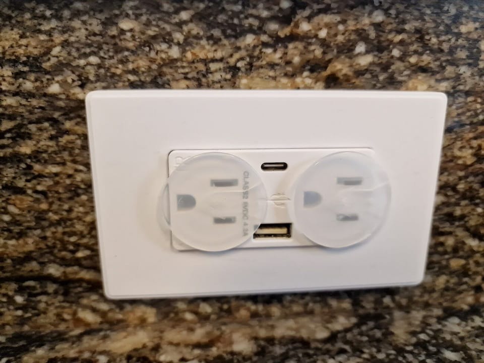 USB outlets in living room, kitchen and bedrooms