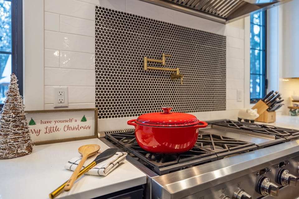 Chef's kitchen featuring a gas range and modern finishes for elevated cooking