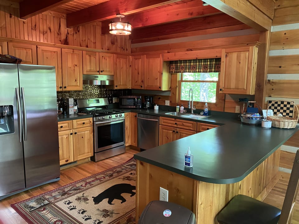 fully appointed kitchen (we have foldable barstools to increase seating)