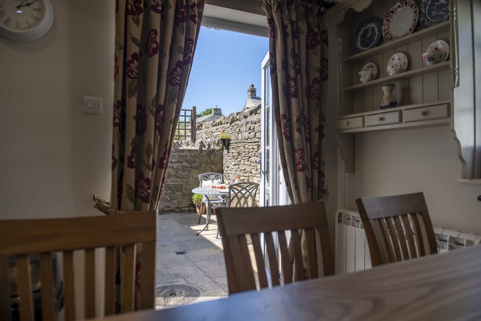 French doors leading out to the courtyard