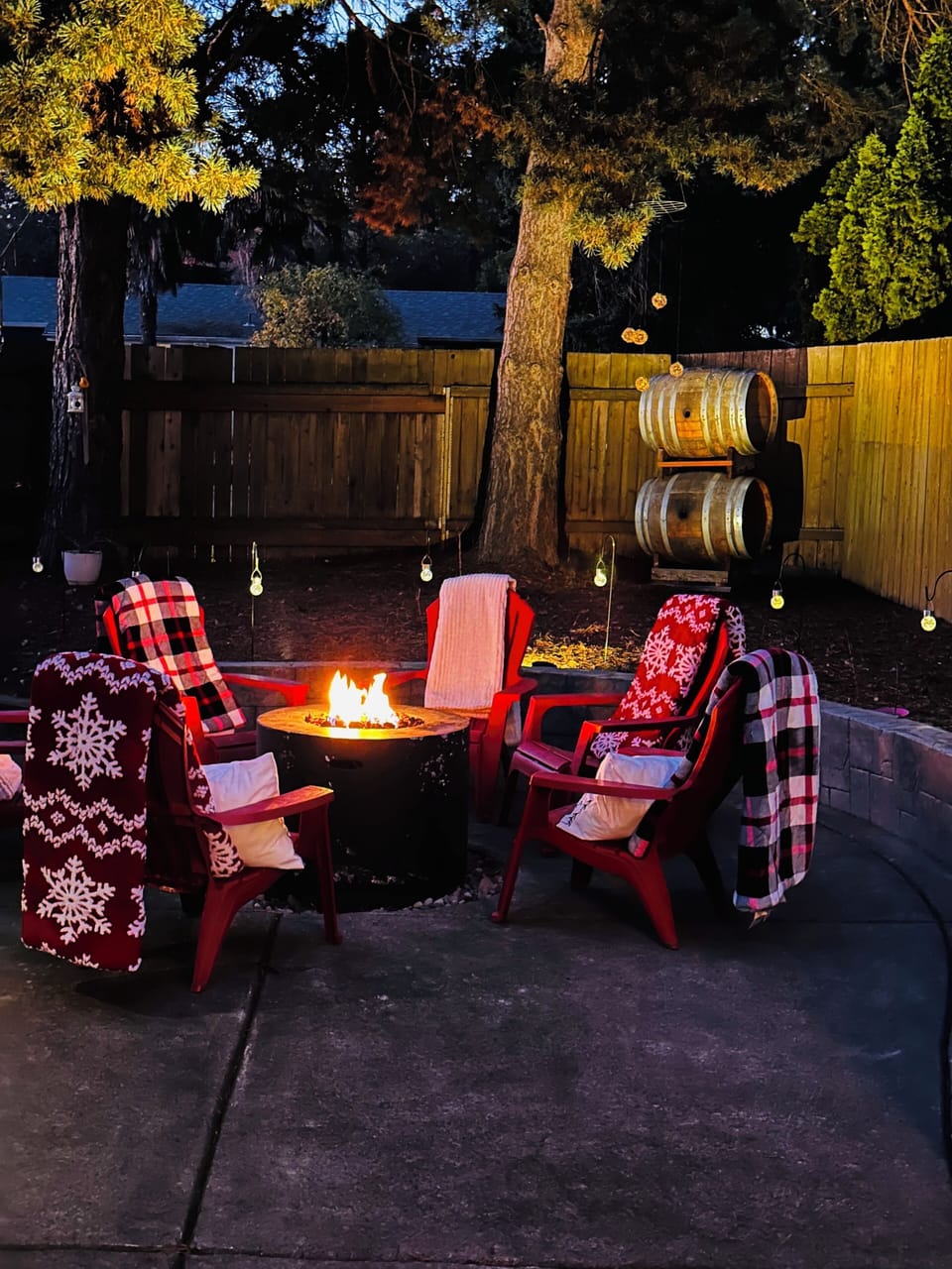 Firepit • Wine barrels from Domaine Serene • Warm blankets • Landscape lighting