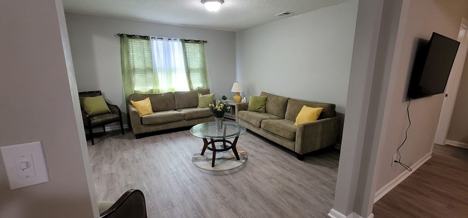Living room and Den with Roku TV