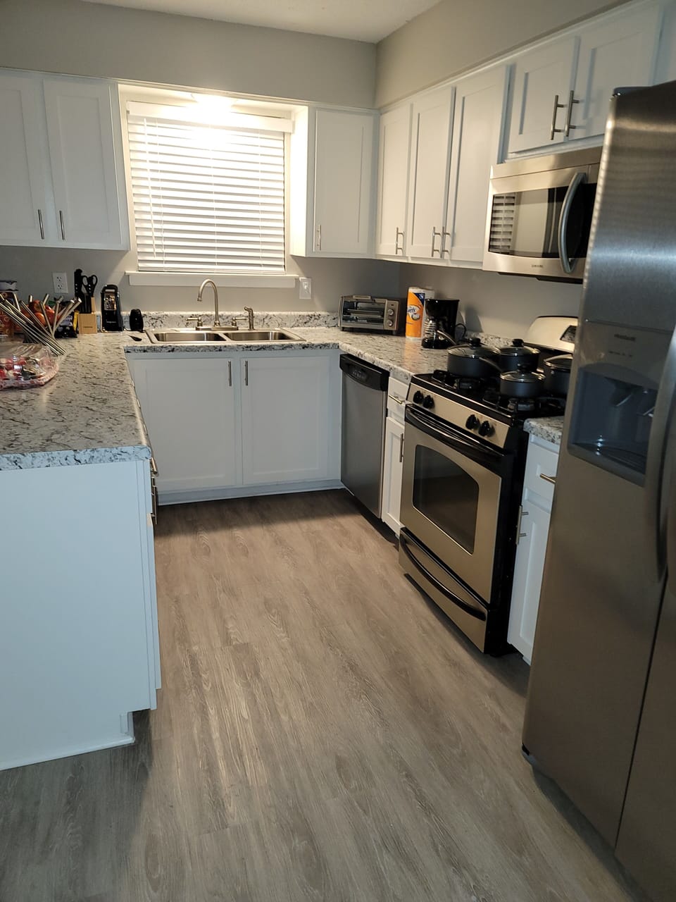 Kitchen with amenities (blender, pots, food, coffee, etc.)