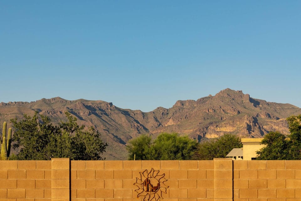 Take in the gorgeous view of the Superstition Mountains right from the backyard