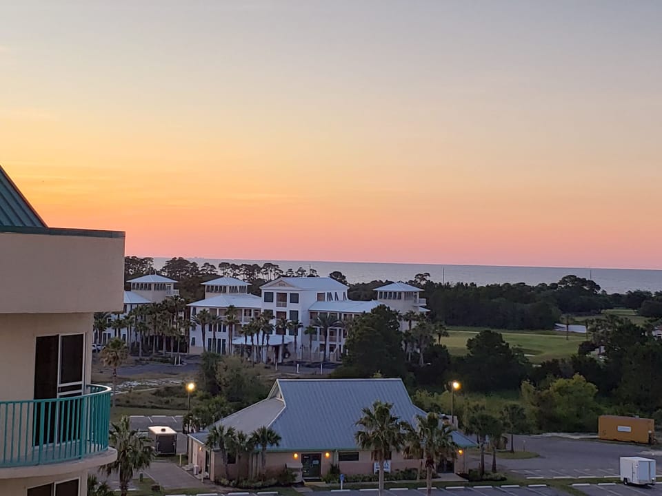 Sunset view from balcony looking to the right at Mobile Bay