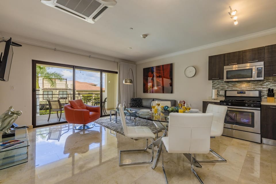 The open space layout allows you to move freely from kitchen, living room and terrace.