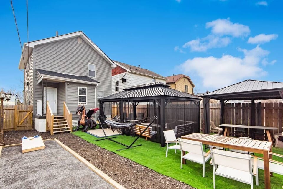 Bocce ball, gazebos, comfortable chairs, tables, turf, cornhole and dragons.