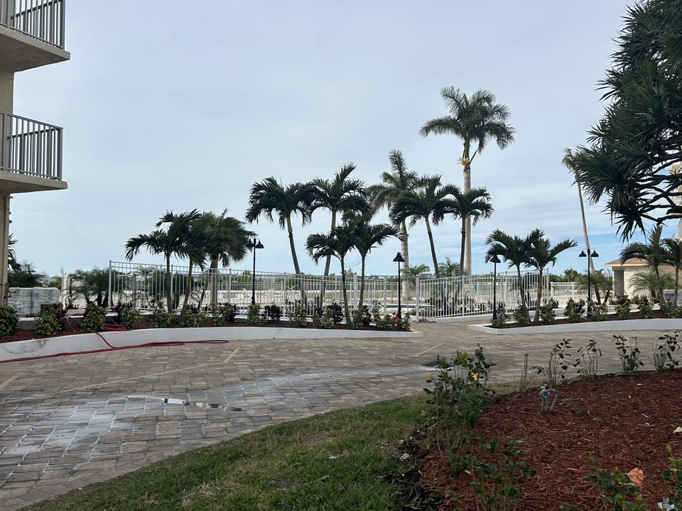 View of walkway and pool between building A & B