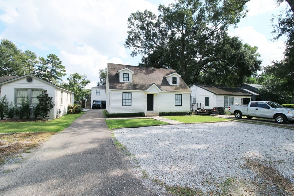 Main house up front, studios at end of the driveway