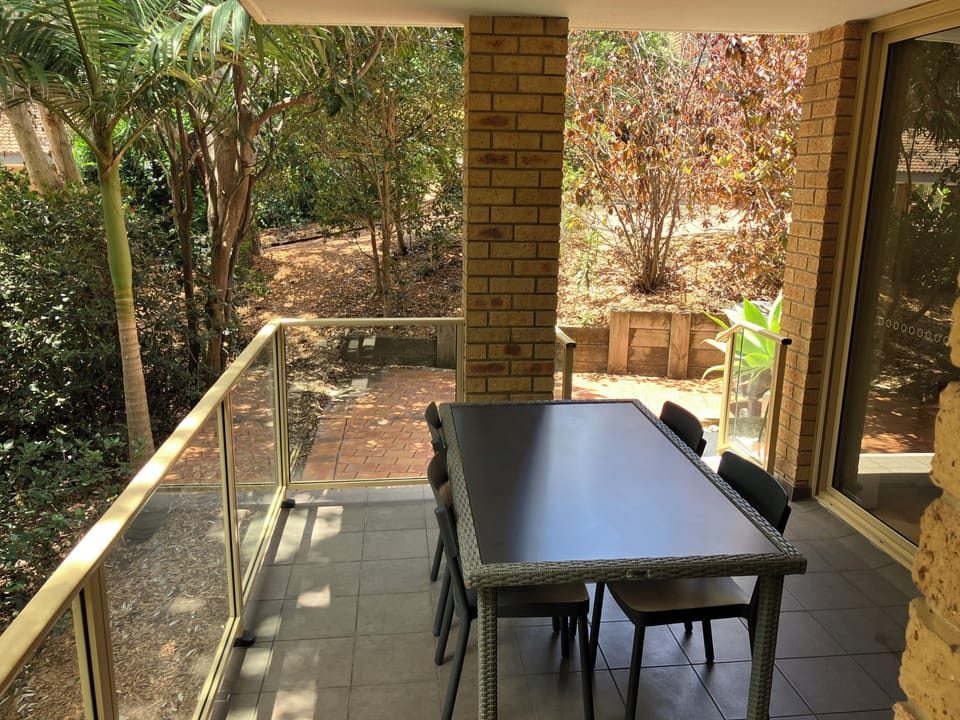 Balcony with adjoining patio