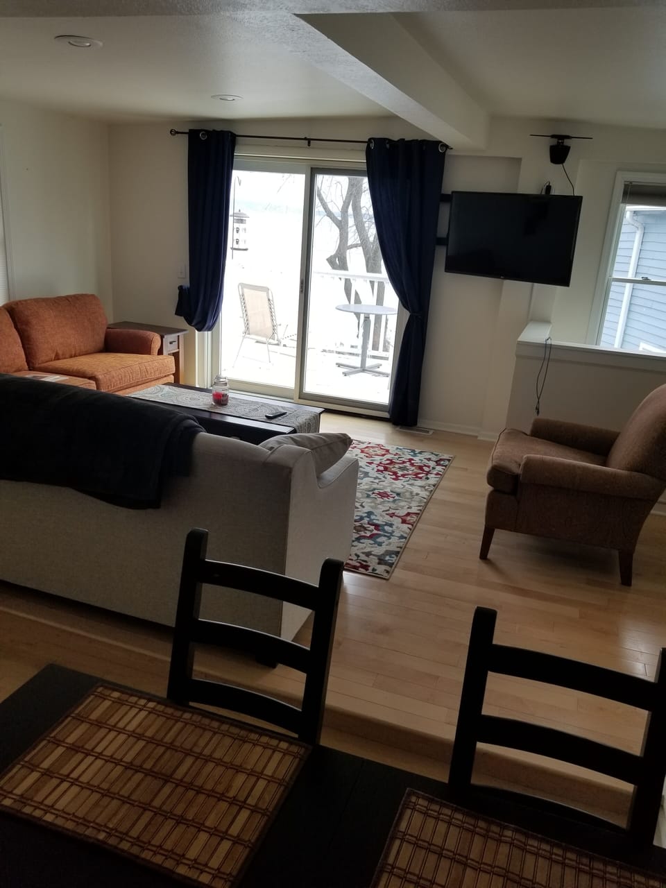 Upper living room/dining room /entrance to private balcony (overlooking Lake) 