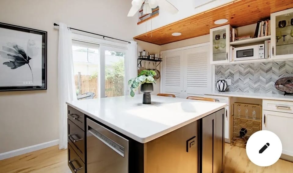 Quartz island, top with seating for breakfast or dinner