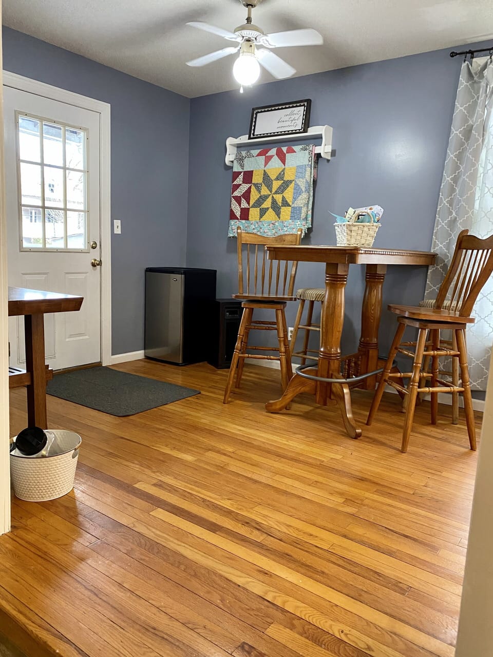 Extra, small refrigerator near pub table