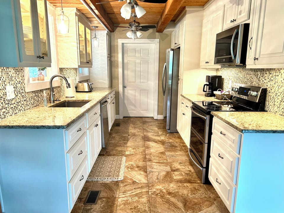 Updated, well-equipped kitchen. 