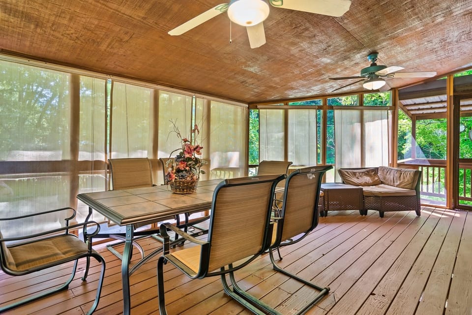 Enclosed and private front porch. open blinds for 180 views of forest and creek
