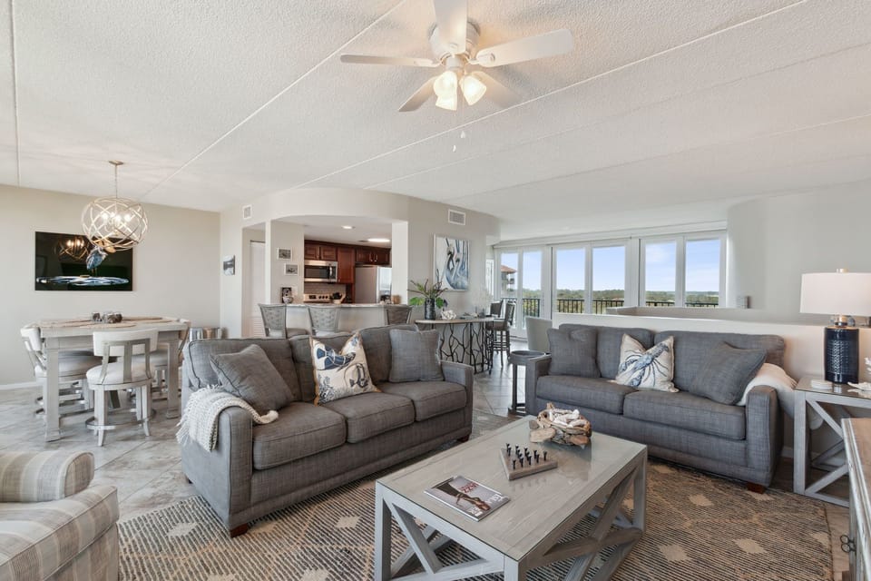 Living Area with Matching Sofa and Loveseat, 2 Comfortable Chairs and Flat Screen TV