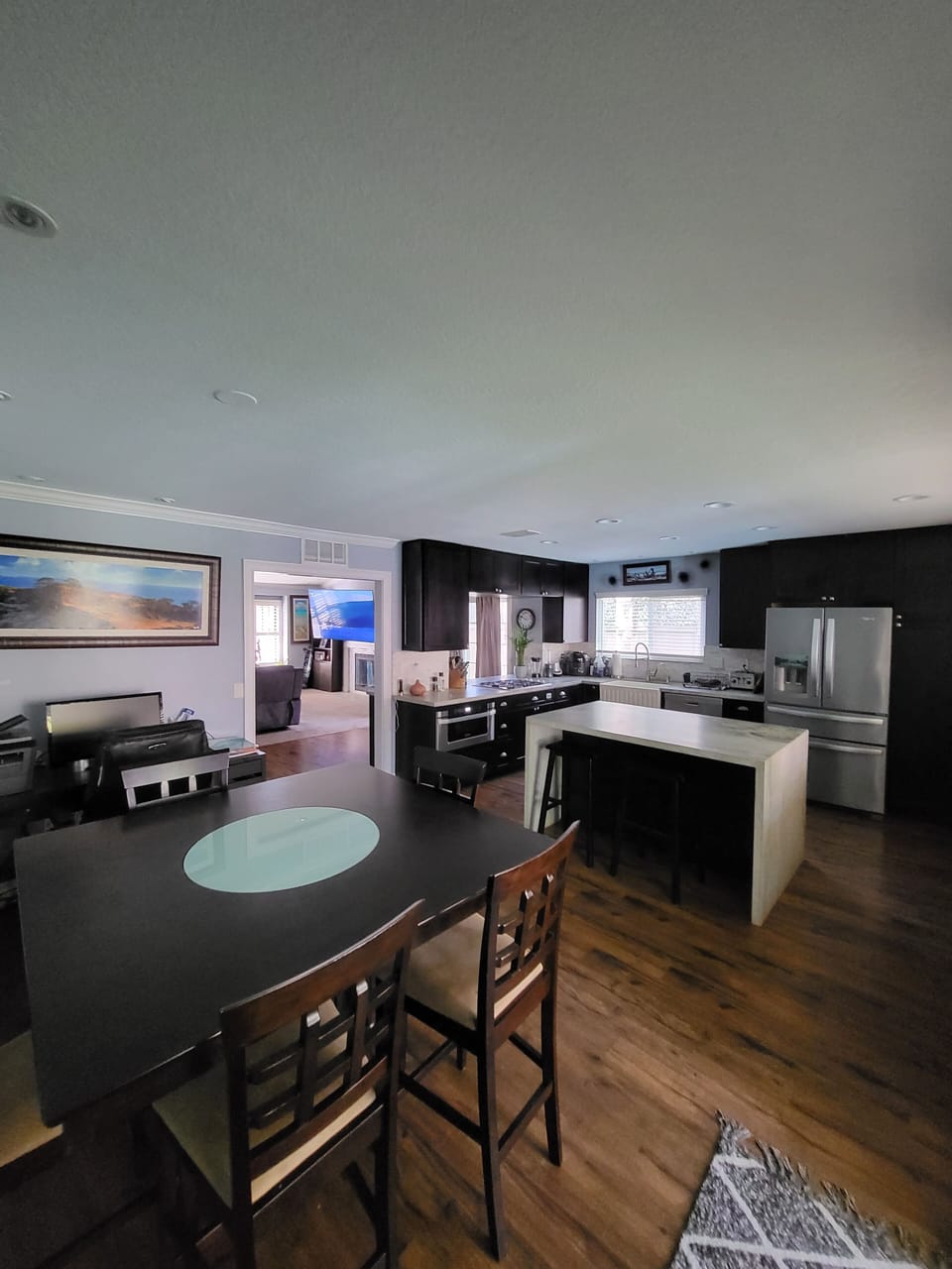 Open modern kitchen with granite countertops