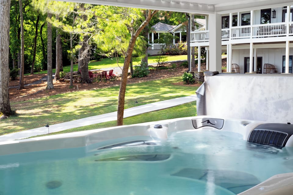 Massive 13-person swim spa with stunning lake views. Open year-round.
