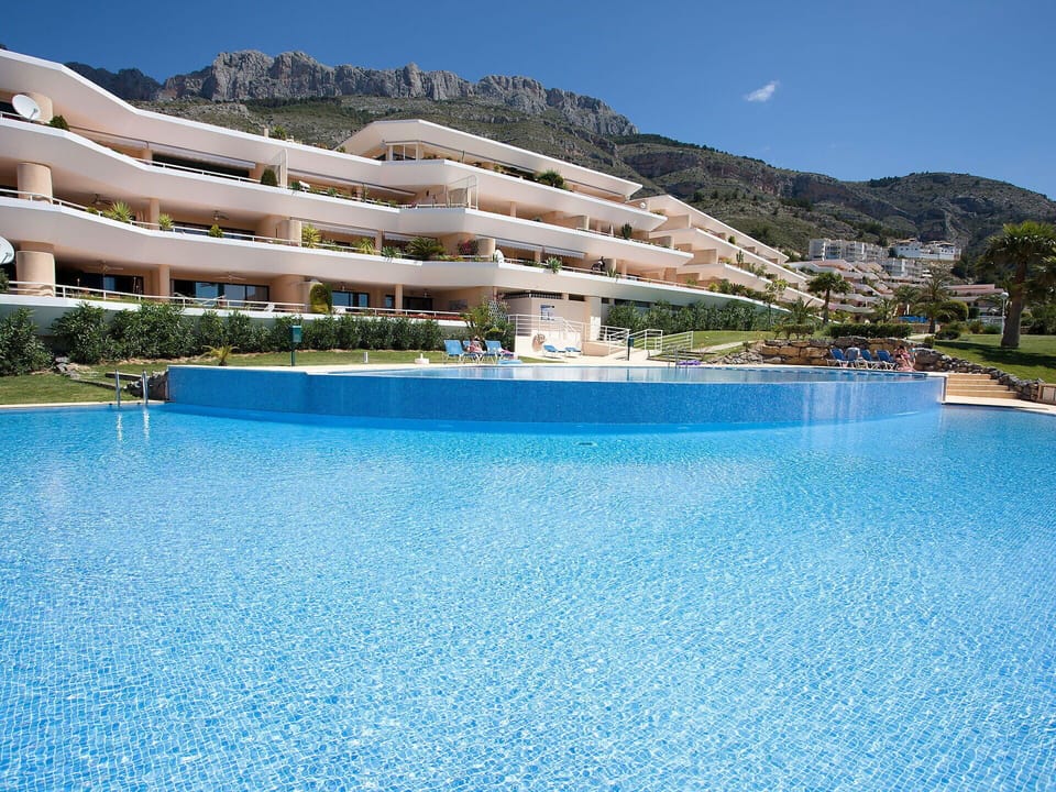 Water, Sky, Property, Building, Plant, Swimming Pool, Azure, Mountain, Cloud, Tree