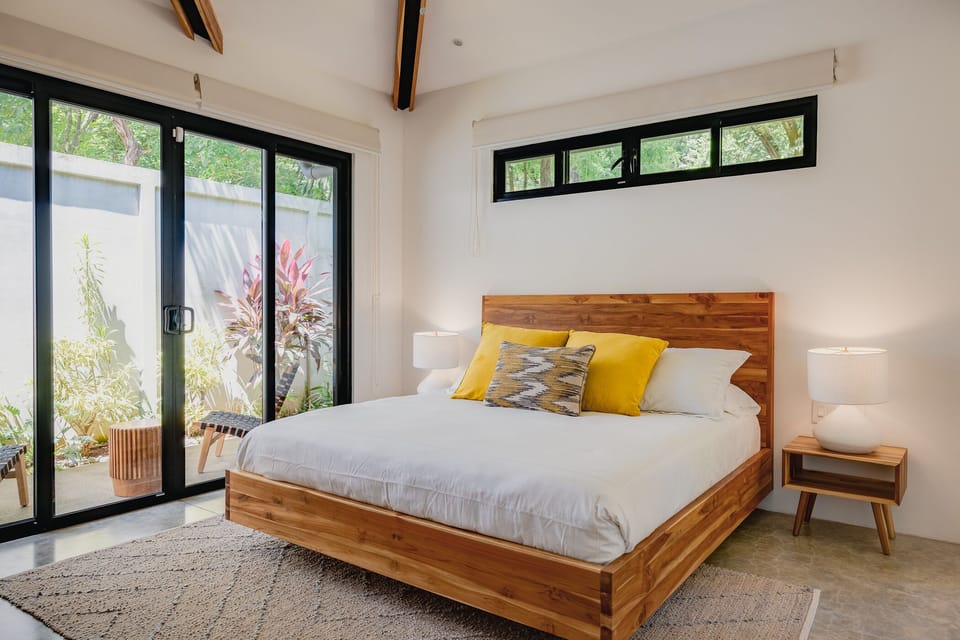 Bedroom 2 with private balcony. 