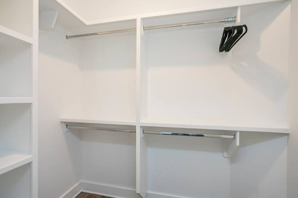 The walk-in closet in Queen Bedroom