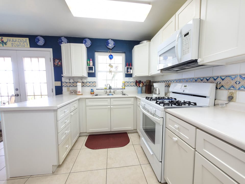 The kitchen is well equipped, and has great natural light.