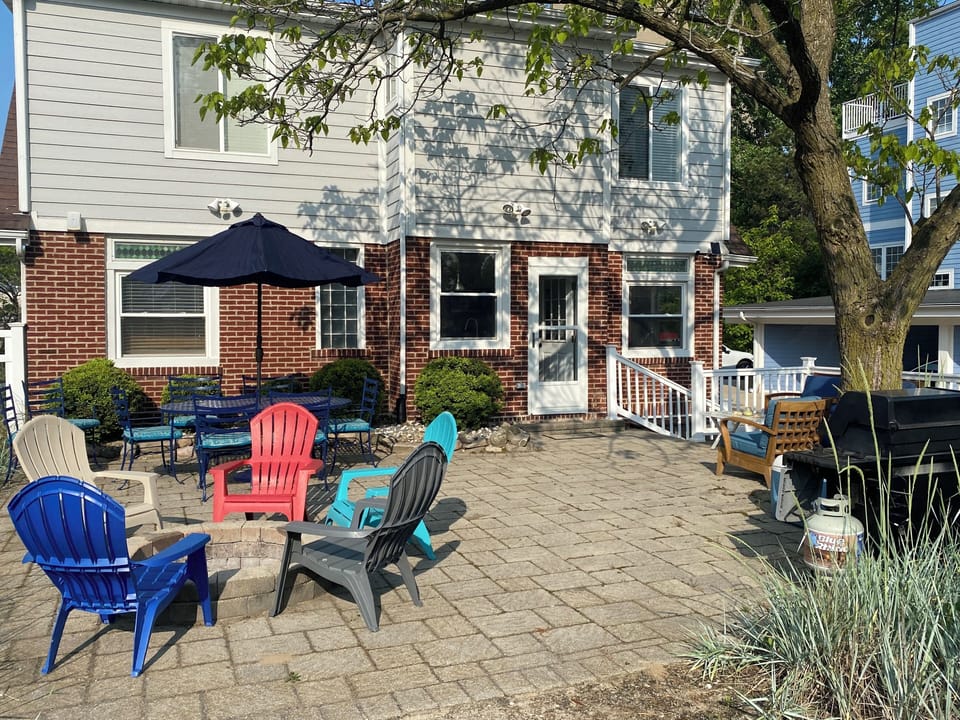 Large backyard with multiple seating areas