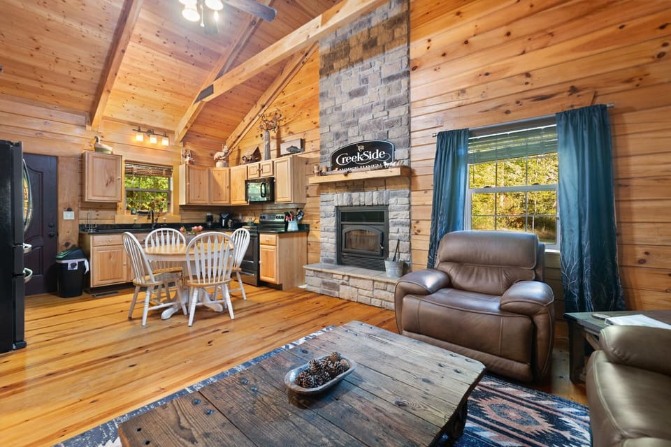 Cozy living room with rustic charm and stone fireplace