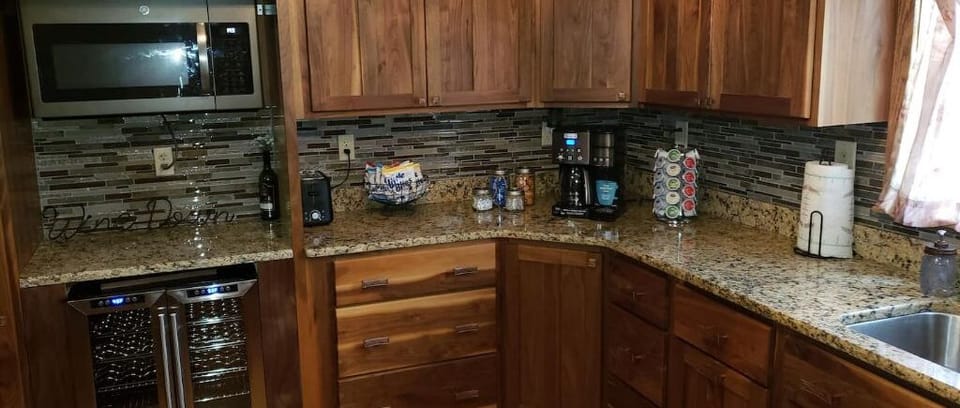 Updated kitchen with coffee maker and snacks