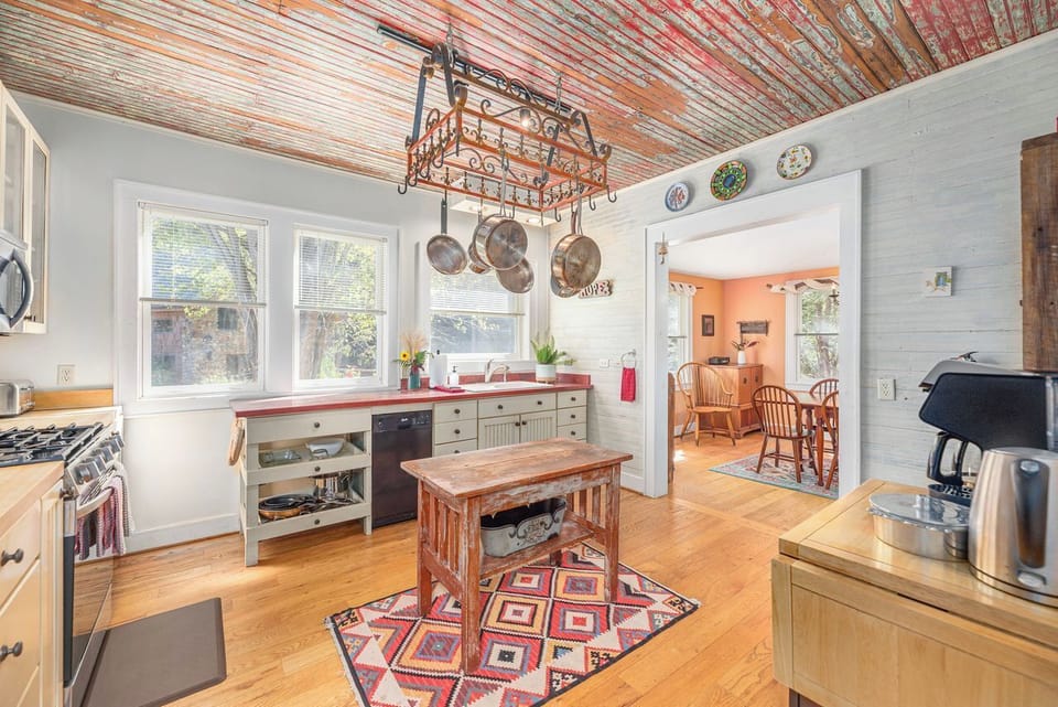 The kitchen is well stocked, features custom concrete counter tops imprinted with local flora and fauna