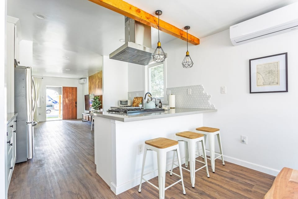 Dine at our eat-in bar right in front of the chef