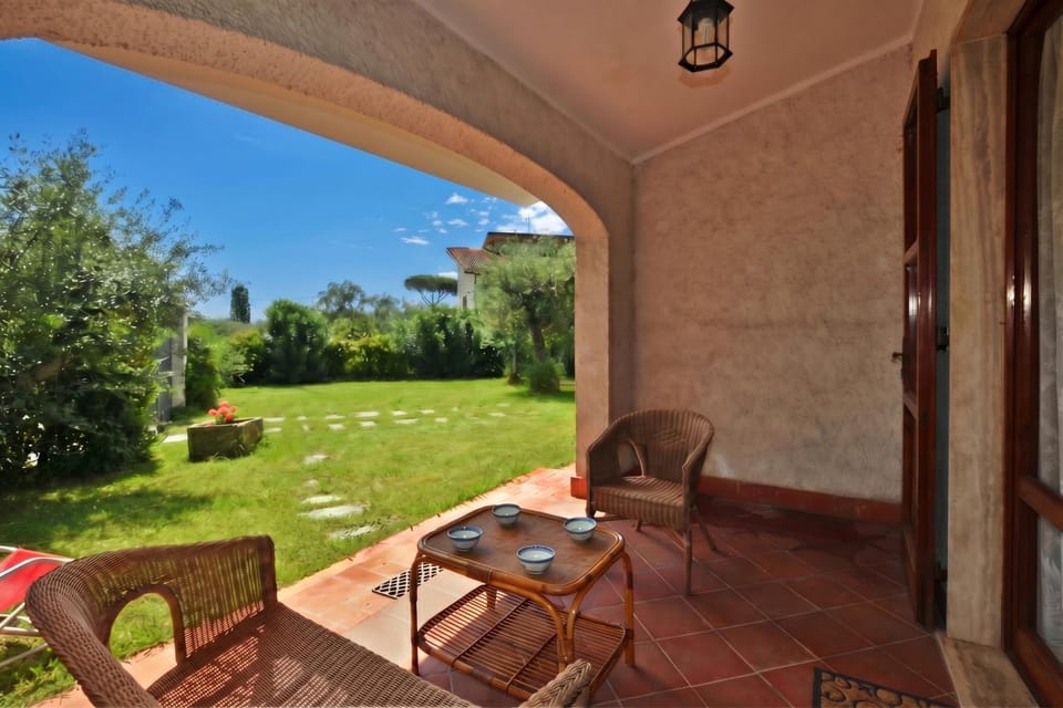 The porch at the front of the house, next to the living room