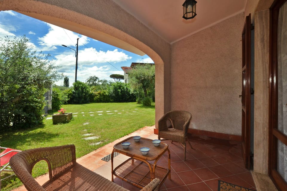 The loggia in front the casa, next to the living-room