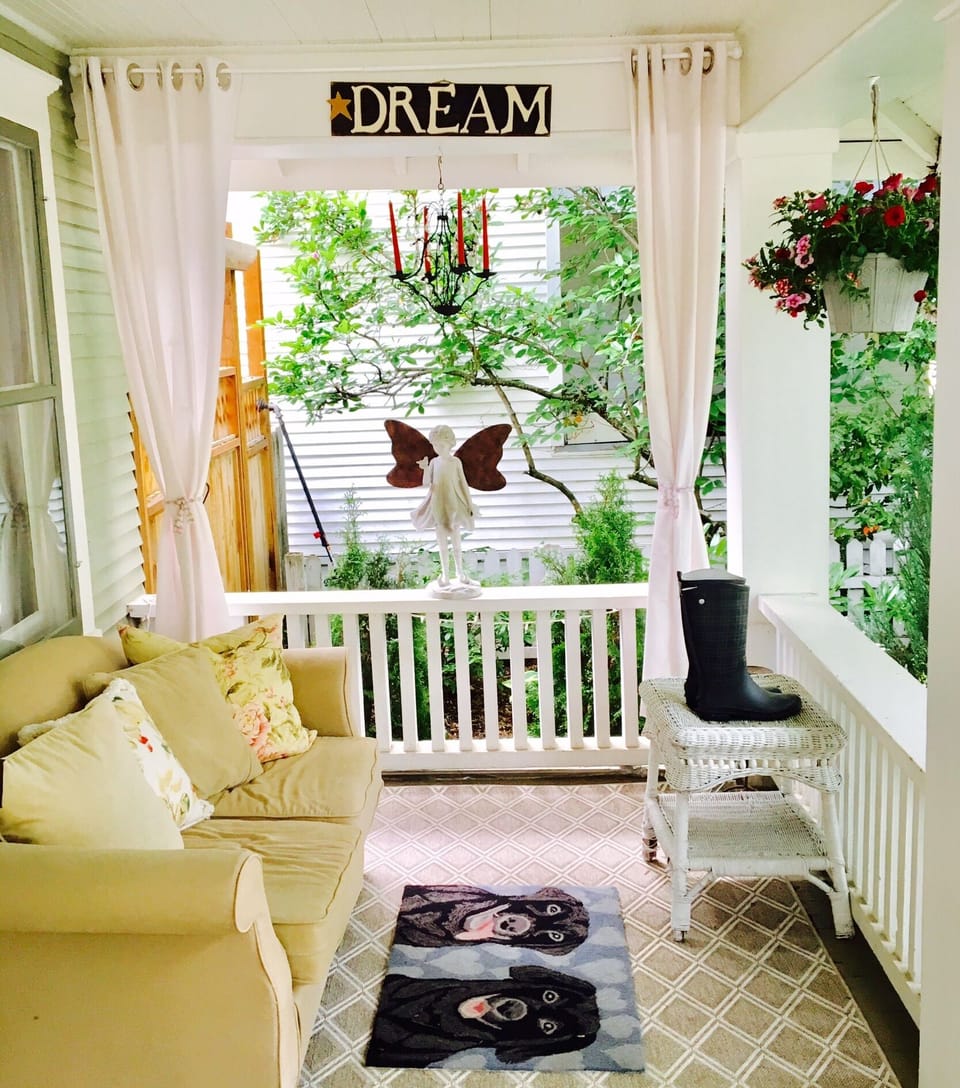 Front porch charm just right for daydreaming!