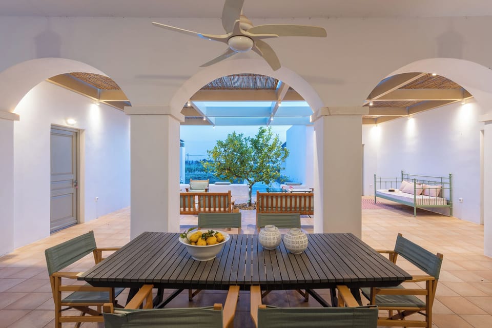 Protected dining on the comfortable verandah in the central courtyard