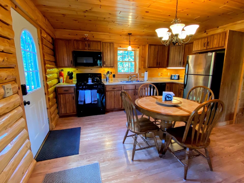 Rustic charm meets modern comfort in the kitchen and dining area