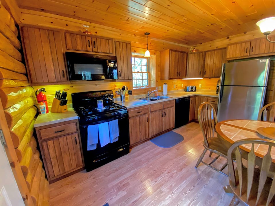Rustic charm meets modern comfort in the kitchen and dining area