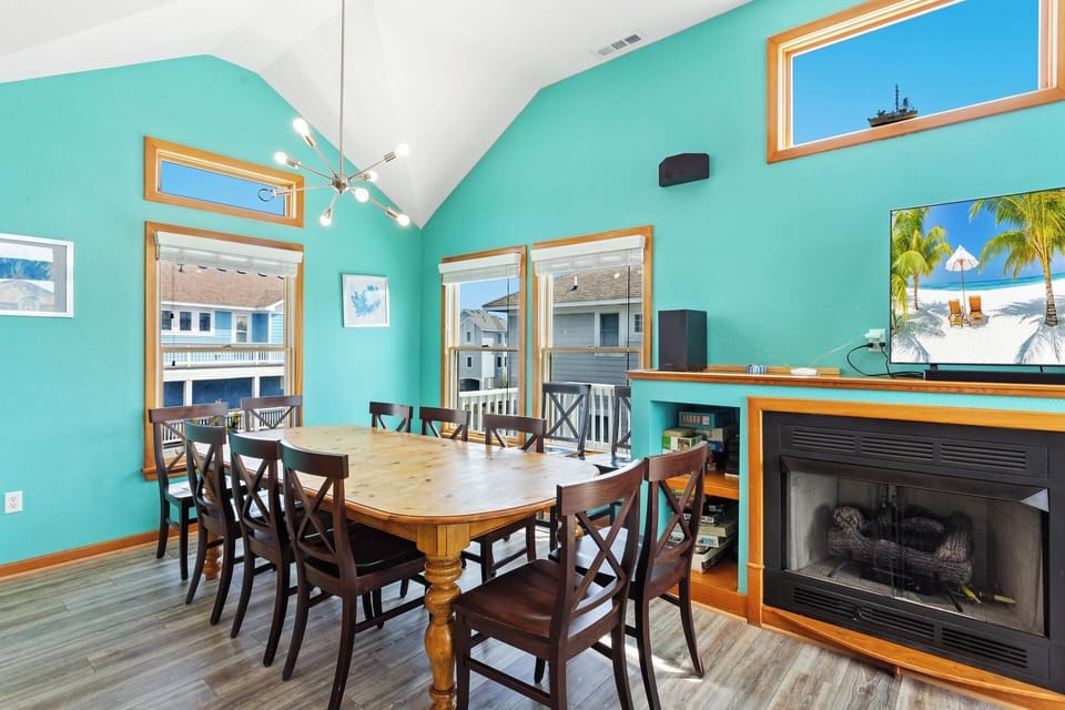 Toast to your vacation around the dining table with seating for 8 (additional chairs available for extra room)! (*Please note: Fireplace is not for guest use.)