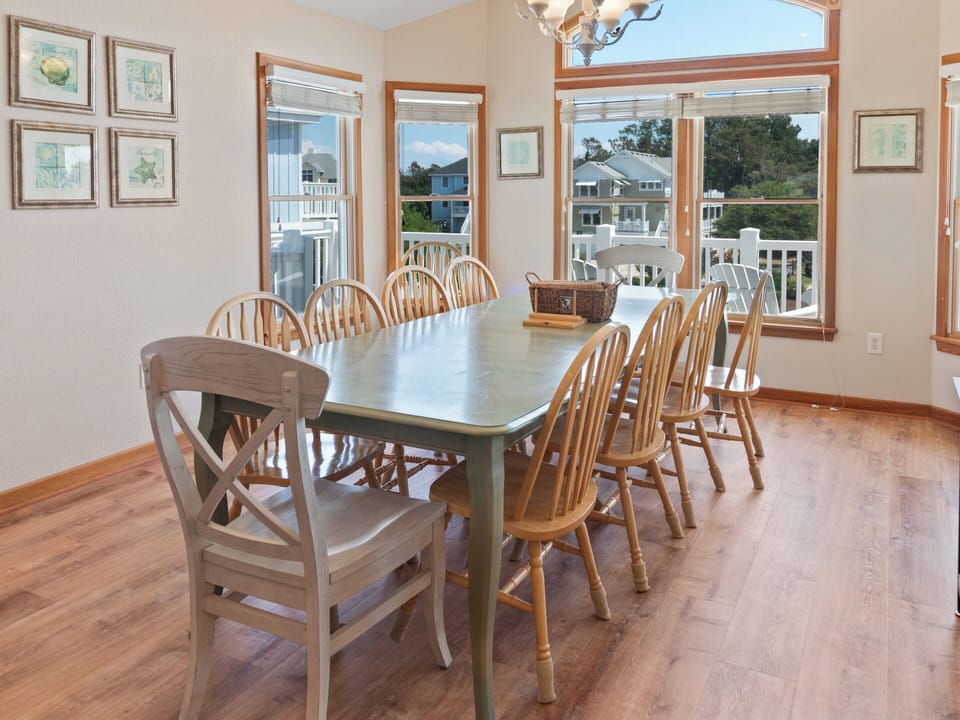 The convenient dining area is the ideal spot to enjoy a meal together as a family after a day at the beach.