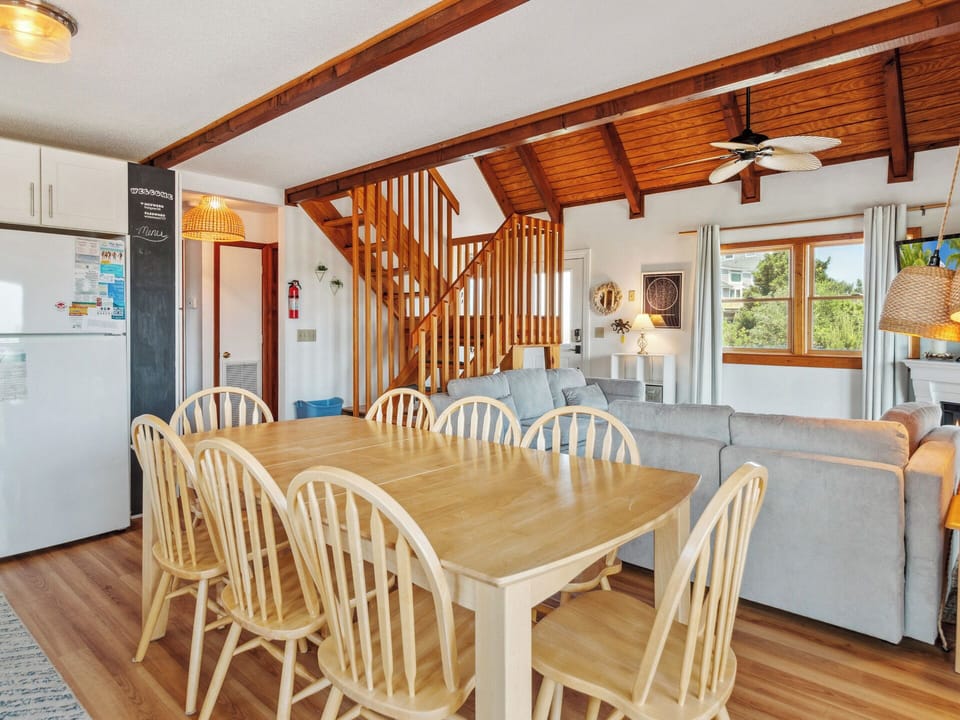 Fully equipped kitchen with seating for 8 at the dining table—ideal for family meals and gatherings.