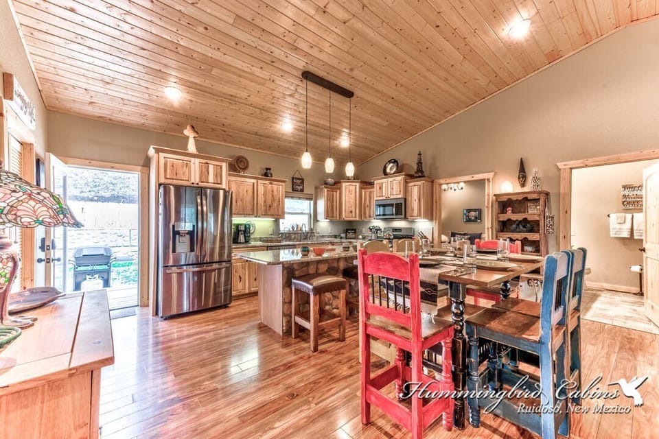 Gorgeous dining area with modern wooden floors and ceiling