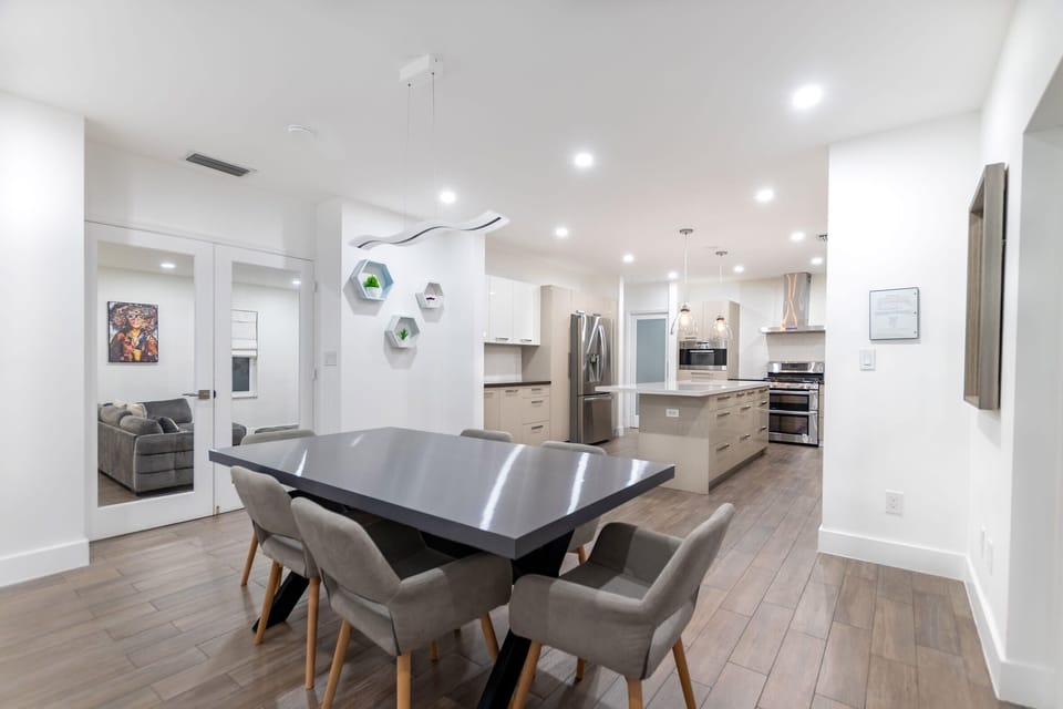 Elegant dining table next to the kitchen.