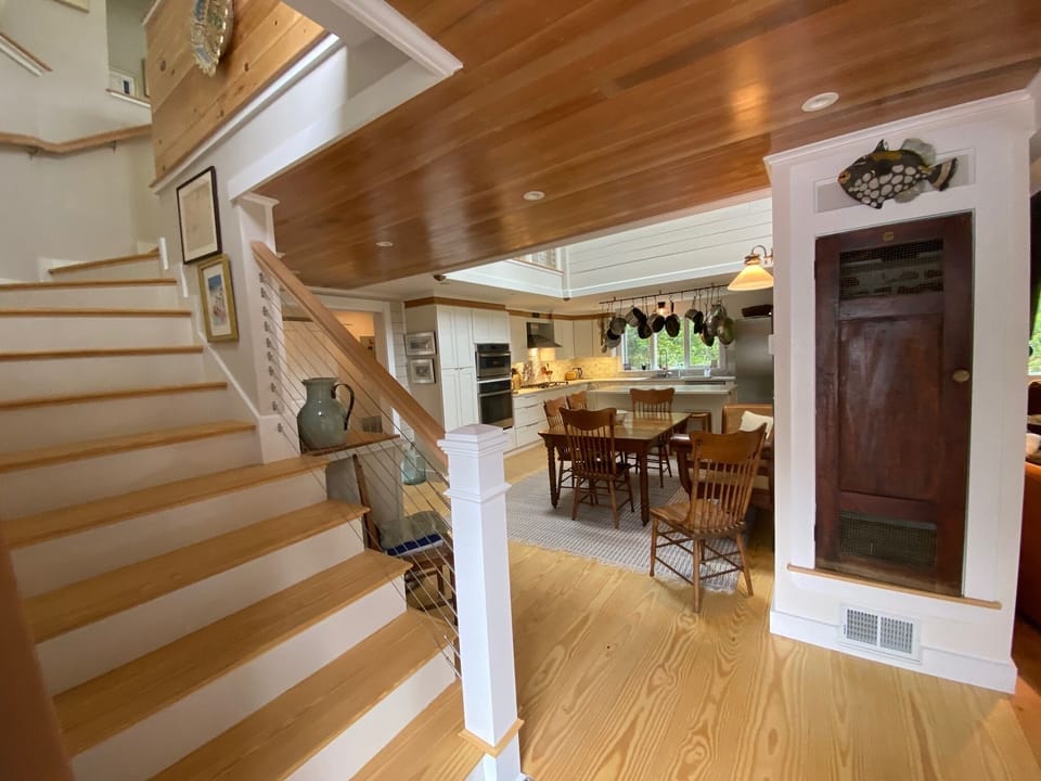 Main entrance, steel cable stair leading to second floor 