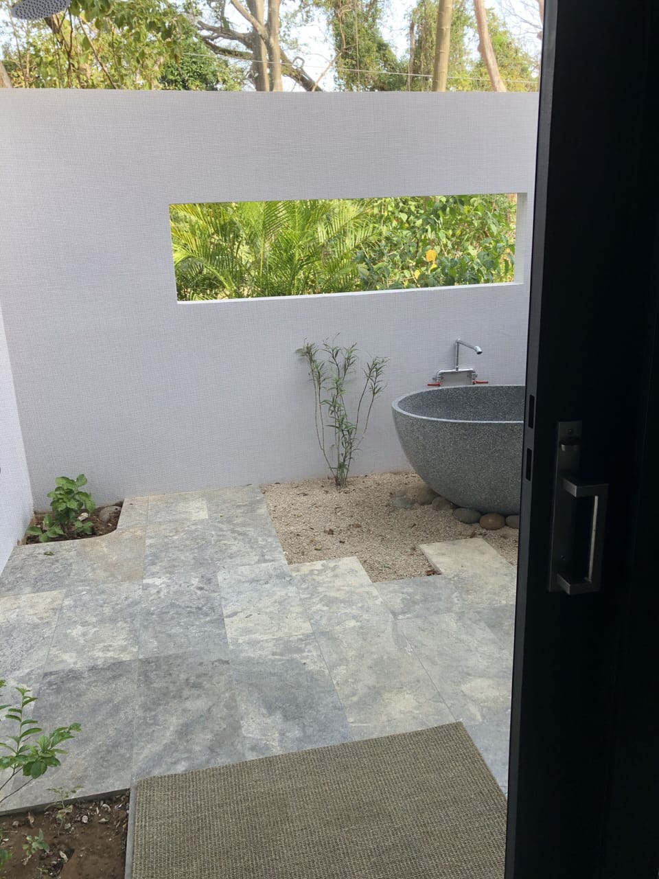 Exterior Bath Area Viewed through Master Bath Sliding Doors