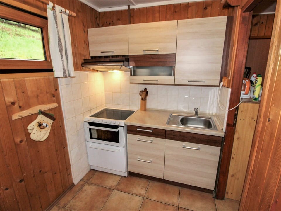 Cabinetry, Countertop, Kitchen Sink, Sink, Building, Kitchen, Drawer, Kitchen Stove, Wood, Interior Design
