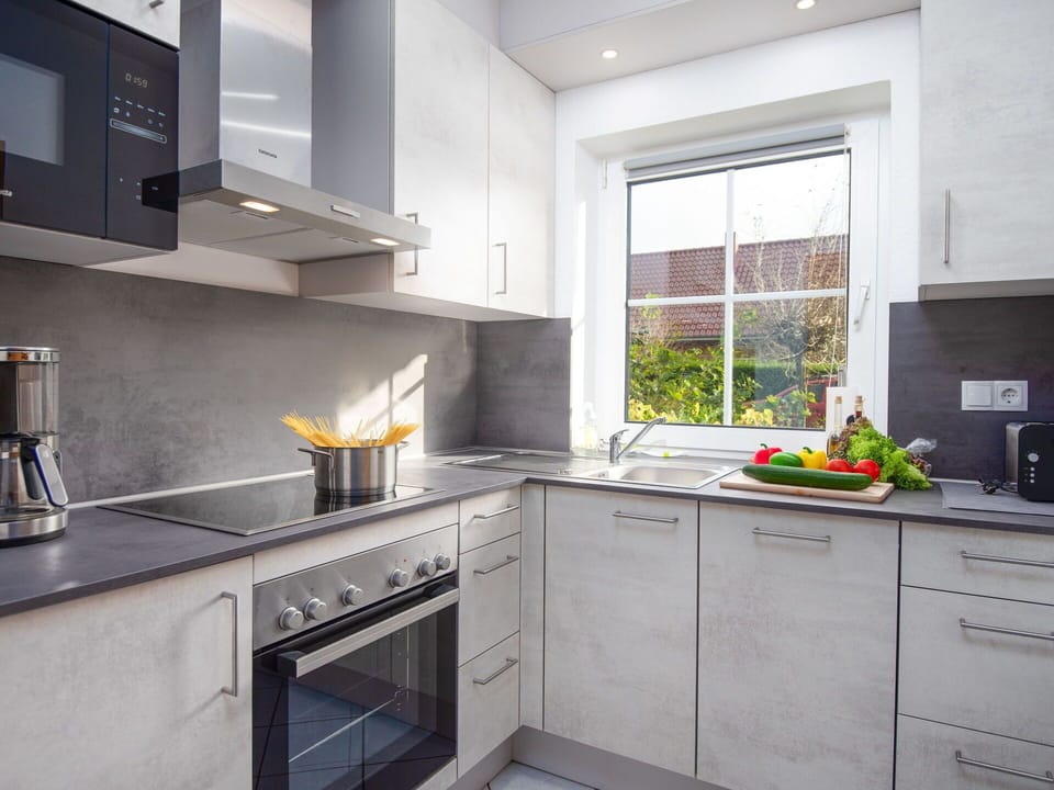 Cabinetry, Property, Building, Countertop, Tap, Kitchen Sink, Window, Kitchen Stove, Kitchen, Interior Design