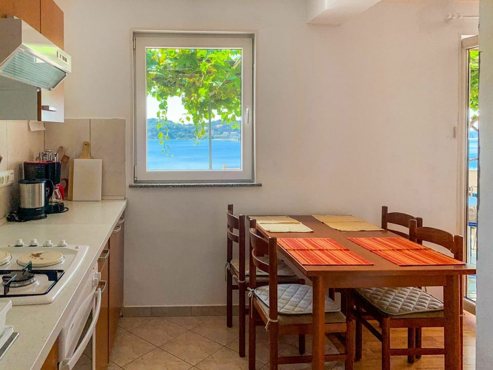 Furniture, Property, Table, Kitchen Sink, Window, Cabinetry, Green, Building, Interior Design