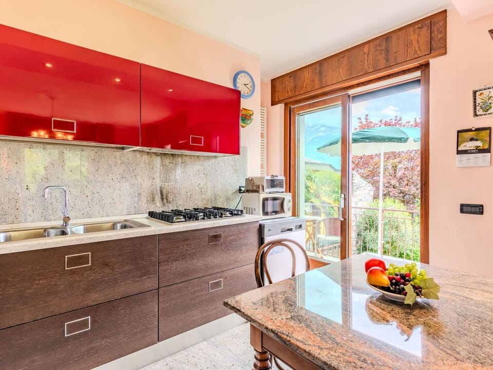Countertop, Cabinetry, Furniture, Sink, Property, Tap, Building, Bathroom Cabinet, Plumbing Fixture, Kitchen