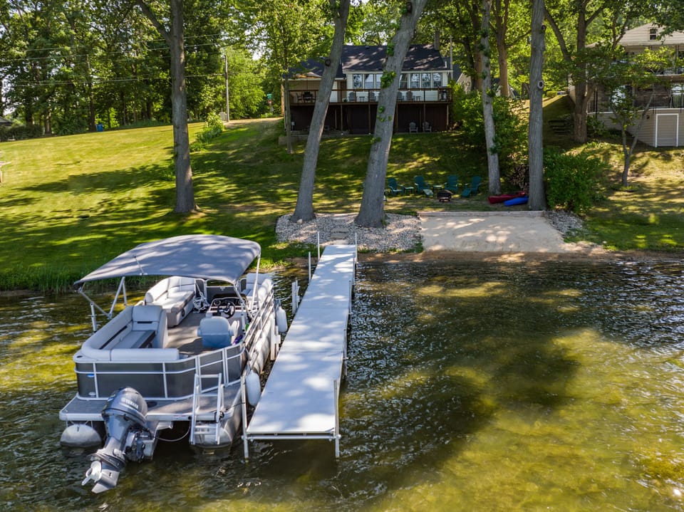 Waterfront Area With Dock And Pontoon